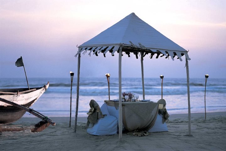 Benaulim Beach fishing village and relaxed shore