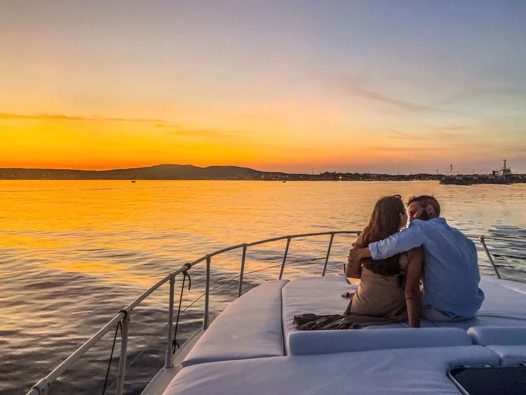 Watch a magical sunset from a yacht in South Goa